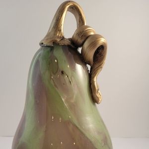 Art glass hand blown green pumpkin sculpture.